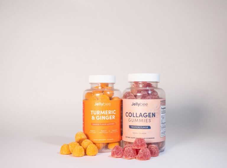 Vibrant product image of Jellybee Turmeric & Ginger and Collagen gummies on a white surface.