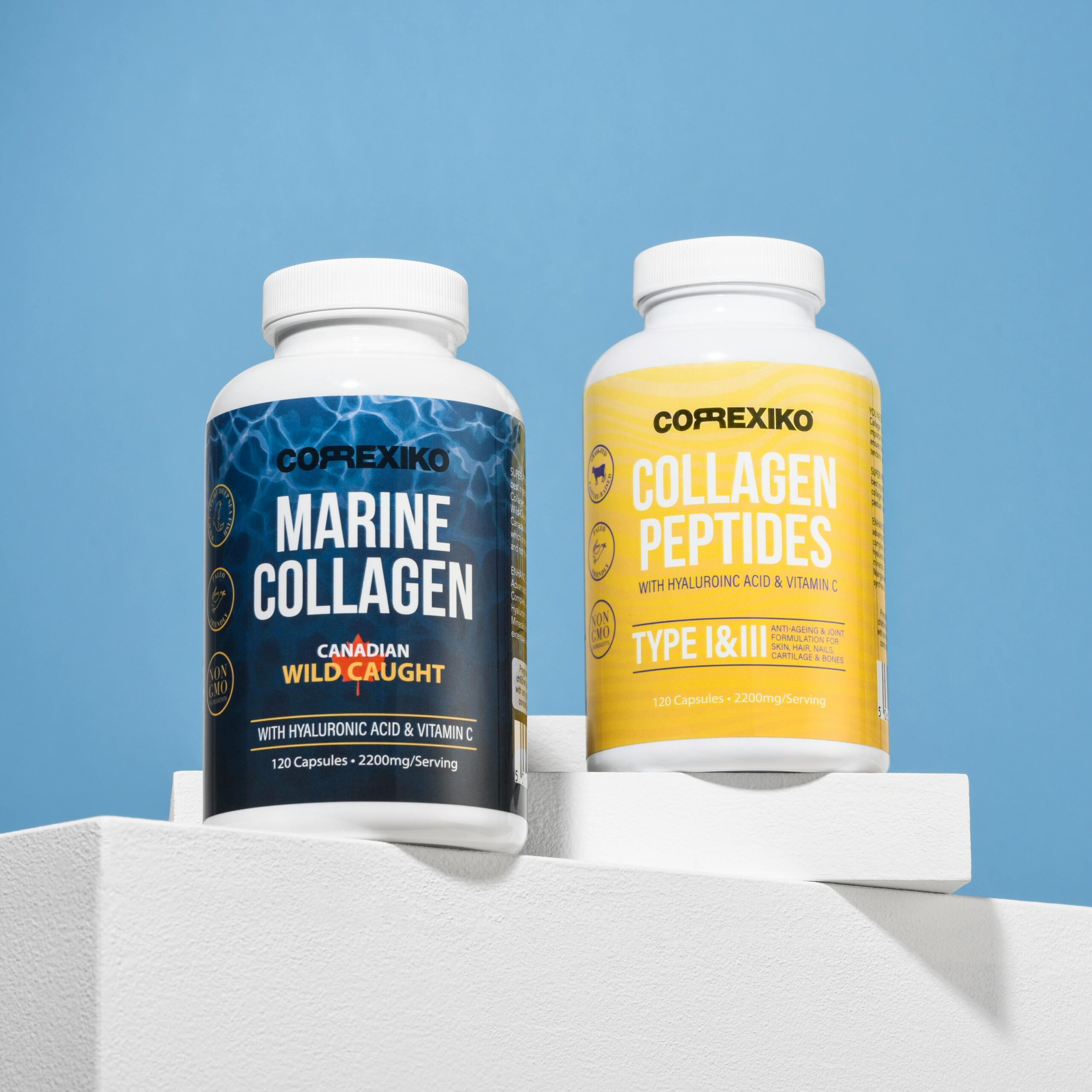 Vibrant display of marine collagen and collagen peptides bottles on white platform.